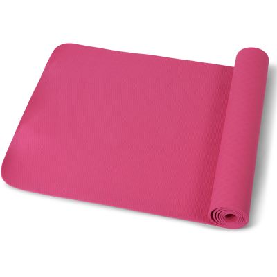 workout zu hause pakket yoga mat rosa und fitnessband halb gerollt